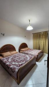 Katil atau katil-katil dalam bilik di شاليه مارينا 4 الساحل الشمالي