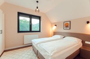 Ένα ή περισσότερα κρεβάτια σε δωμάτιο στο Selters Guesthouse