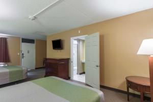 Postel nebo postele na pokoji v ubytování Motel 6 Sherman, TX