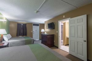 Postel nebo postele na pokoji v ubytování Motel 6 Sherman, TX