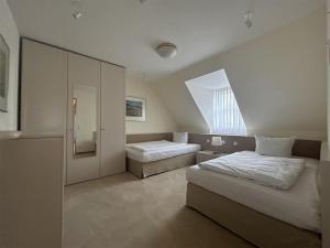 Giường trong phòng chung tại Gut Matheshof Apartments