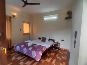 JAP Guest House & Apartments客房内的一张或多张床位