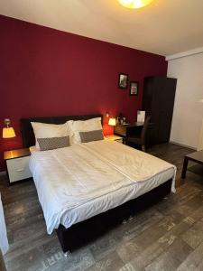 Postel nebo postele na pokoji v ubytování Hotel Parc & Lac