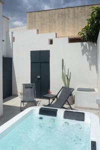 The swimming pool at or close to Nara Apartments 1 - Private Jacuzzi
