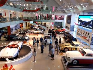 a group of people looking at cars in a car show at Cabaña La Solanita in Termas de Río Hondo