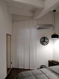 Postel nebo postele na pokoji v ubytování Borgo Fontana B&B
