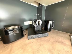 Kuchyň nebo kuchyňský kout v ubytování Bonnystay Lörrach l Balcony l Center l Design