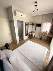 Postel nebo postele na pokoji v ubytování Sahil Butik Otel