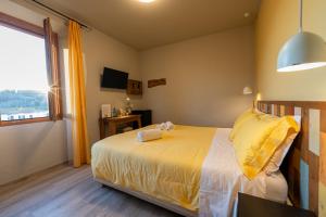 Postel nebo postele na pokoji v ubytování B&B L'Eroico