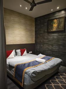 Ένα ή περισσότερα κρεβάτια σε δωμάτιο στο Stanza Luxurious Stay