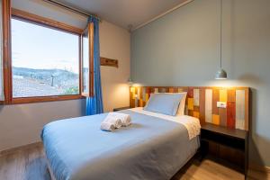 Postel nebo postele na pokoji v ubytování B&B L'Eroico