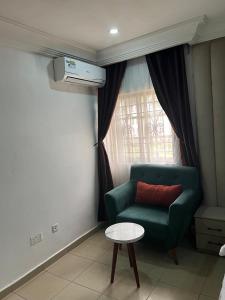 Ein Sitzbereich in der Unterkunft Events & Suites
