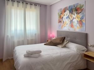 Ένα ή περισσότερα κρεβάτια σε δωμάτιο στο La casa de siempre +26 φωτογραφίες