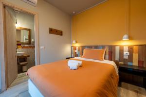 Postel nebo postele na pokoji v ubytování B&B L'Eroico