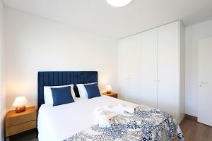 En eller flere senge i et værelse på T1-Fortuna - Sea in plain sight + 33 billeder