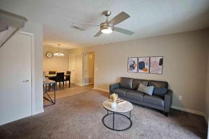 a living room with a couch and a table at Northtown Apartments 10a I Spacious 1 Bed 1 Bath in Jackson