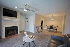 a living room with a couch and a fireplace at Northtown Apartments 10a I Spacious 1 Bed 1 Bath in Jackson
