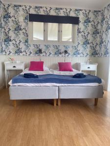 Letto o letti in una camera di Pensionat bryggan