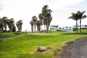 Vonkajšia záhrada v ubytovaní Villa Caleta Golf