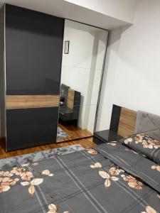 Postel nebo postele na pokoji v ubytování Apartman Amfora Vranje + 4 fotografie