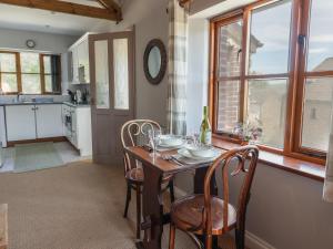 Kuchyň nebo kuchyňský kout v ubytování Megs Roost