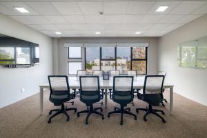 a conference room with a long table and chairs at District Polanco by Lumina in Mexico City +61 photos
