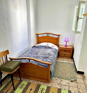 Postel nebo postele na pokoji v ubytování Hotel Paris