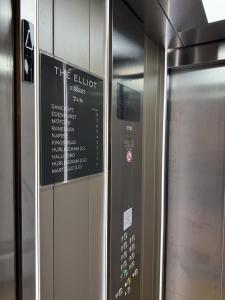 a elevator in a subway train with a sign on it at Edenhurst By Pureserviced in Plymouth +9 photos