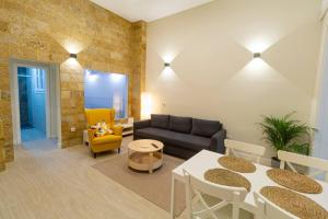Posezení v ubytování SH Casa Candelaria Apartamento en el centro