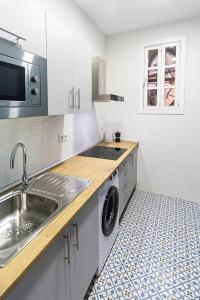 Kuchyň nebo kuchyňský kout v ubytování SH Casa Candelaria Apartamento en el centro
