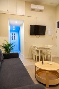 TV a/nebo společenská místnost v ubytování SH Casa Candelaria Apartamento en el centro