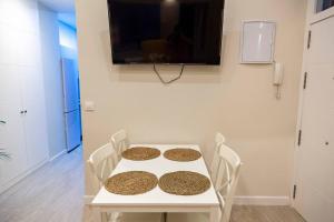 TV a/nebo společenská místnost v ubytování SH Casa Candelaria Apartamento en el centro