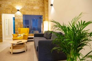 Posezení v ubytování SH Casa Candelaria Apartamento en el centro