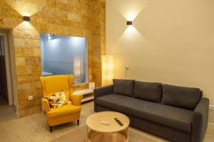 Posezení v ubytování SH Casa Candelaria Apartamento en el centro