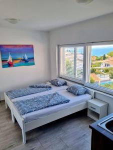 Katil atau katil-katil dalam bilik di Matoc apartments