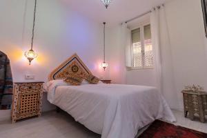 Posteľ alebo postele v izbe v ubytovaní SH Rujacor Mare Apartamento chic en la Viña