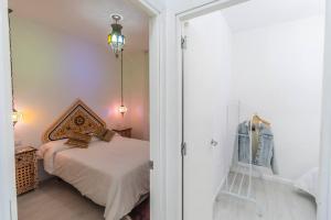 Posteľ alebo postele v izbe v ubytovaní SH Rujacor Mare Apartamento chic en la Viña