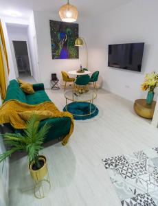 Televízia a/alebo spoločenská miestnosť v ubytovaní SH Rujacor Mare Apartamento chic en la Viña