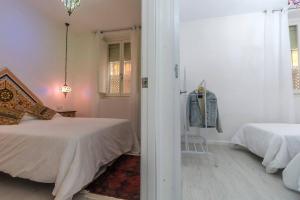 Posteľ alebo postele v izbe v ubytovaní SH Rujacor Mare Apartamento chic en la Viña