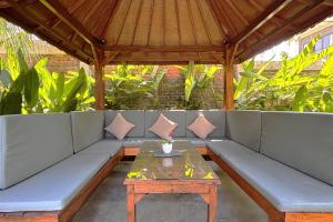 Posezení v ubytování Bali Bata Canggu Guesthouse