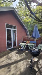 Zahrada ubytování Vinds Våningen + 6 fotografií