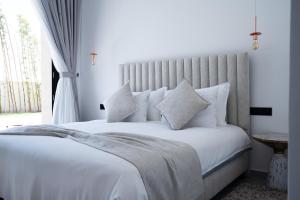 Ένα ή περισσότερα κρεβάτια σε δωμάτιο στο Modern Villa Safa +17 φωτογραφίες