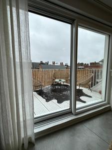Balkoni atau teres di Penthouse le GuiZa