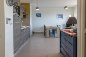 Η κουζίνα ή μικρή κουζίνα στο Les Oyats - Appartement 1 chambre - Balcon +5 φωτογραφίες