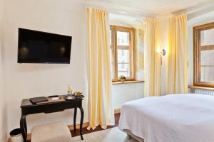 Ένα ή περισσότερα κρεβάτια σε δωμάτιο στο Hotel David an der Donau