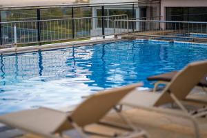 Πισίνα στο ή κοντά στο Ngolu Hotel and Residences