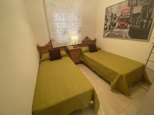 Postel nebo postele na pokoji v ubytování Apartamentos Marina Park
