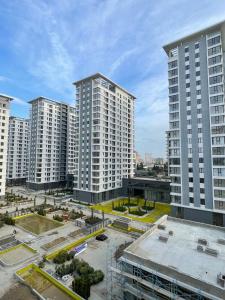 an aerial view of tall buildings in a city at Avant Daireleri in Baku
