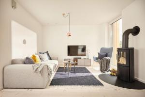 Televiisor ja/või meelelahutuskeskus majutusasutuses Villa Azure II