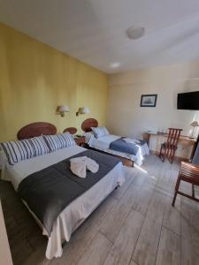 Postel nebo postele na pokoji v ubytování Gran Hotel Presidente